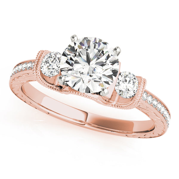 Round Three-Stone Diamond Engagement Ring · 0.32 ct tw