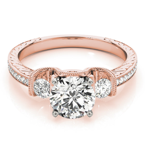 Round Three-Stone Diamond Engagement Ring · 0.32 ct tw