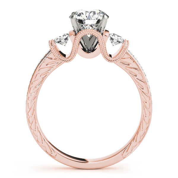 Round Three-Stone Diamond Engagement Ring · 0.32 ct tw