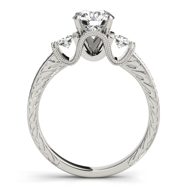 Round Three-Stone Diamond Engagement Ring · 0.34 ct tw