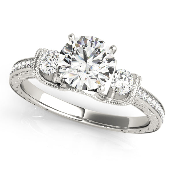 Round Three-Stone Diamond Engagement Ring · 0.34 ct tw