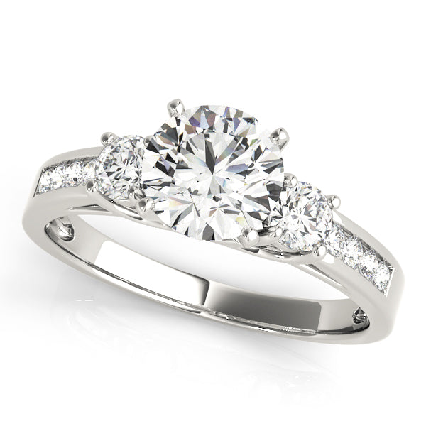 Round Three-Stone Diamond Engagement Ring · 0.38 ct tw