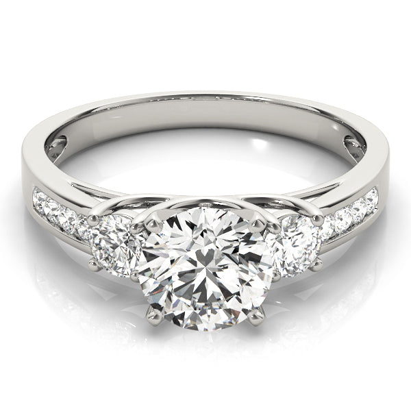 Round Three-Stone Diamond Engagement Ring · 0.38 ct tw
