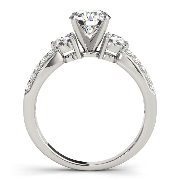 Round Three-Stone Diamond Engagement Ring · 0.62 ct tw