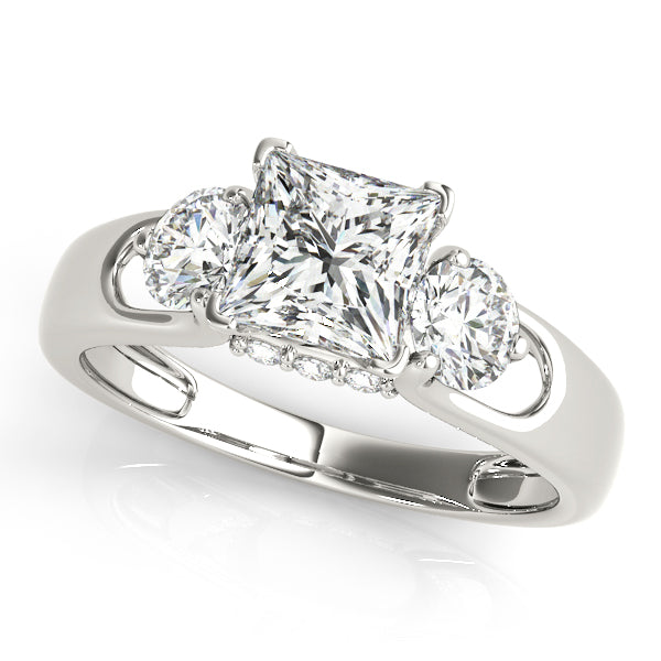 Round Three-Stone Diamond Engagement Ring · 0.56 ct tw