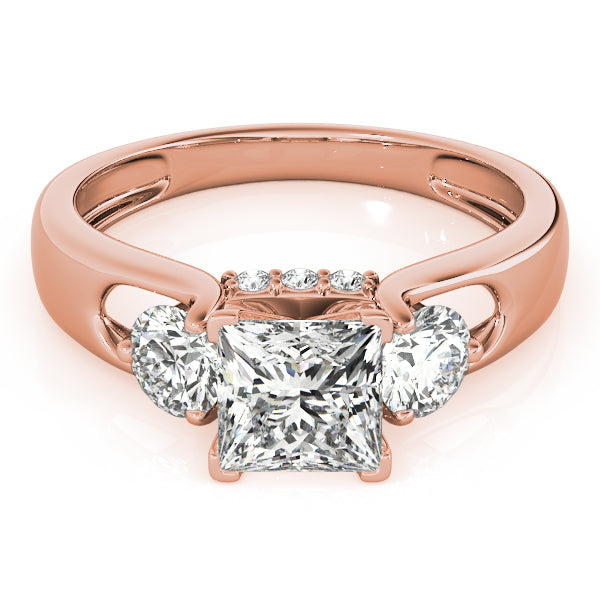 Round Three-Stone Diamond Engagement Ring · 0.56 ct tw