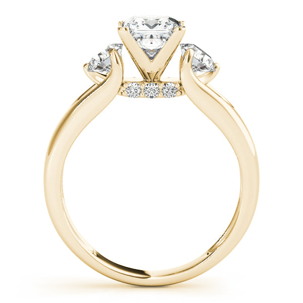 Round Three-Stone Diamond Engagement Ring · 0.56 ct tw