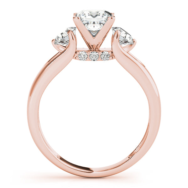 Round Three-Stone Diamond Engagement Ring · 0.56 ct tw