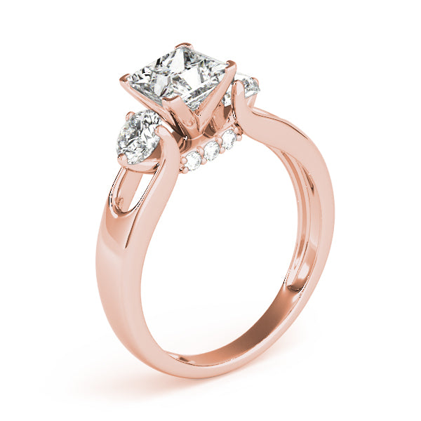 Round Three-Stone Diamond Engagement Ring · 0.56 ct tw