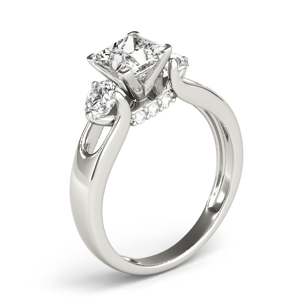 Round Three-Stone Diamond Engagement Ring · 0.56 ct tw