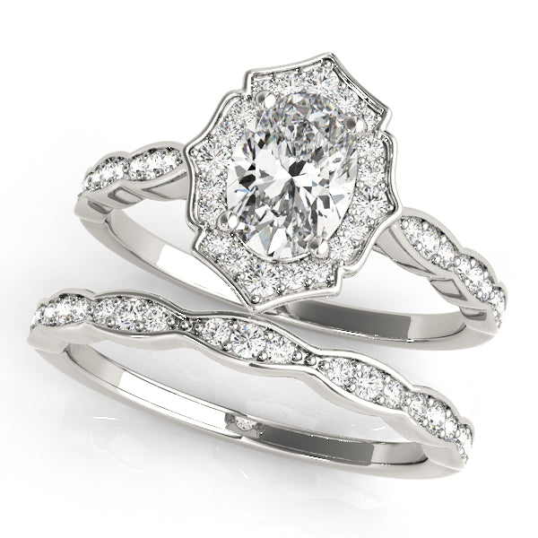 Oval Scalloped Halo Diamond Ring · 0.26 ct tw