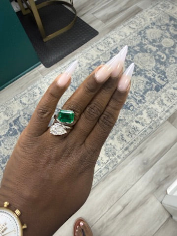 The finished two-stone ring on hand