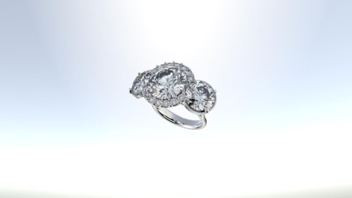 A three-stone halo diamond ring